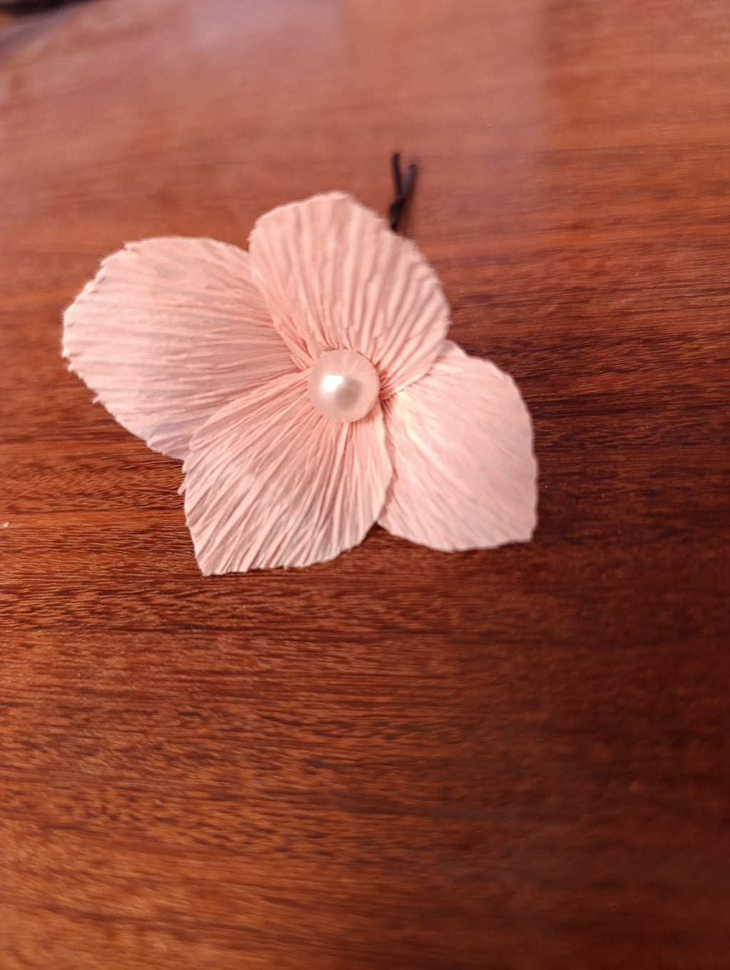 Fleur rose pour cheveux